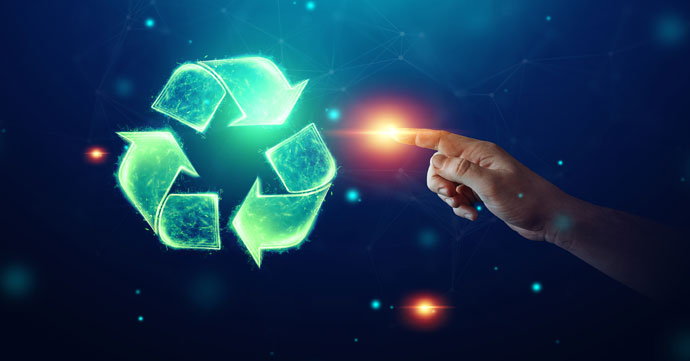 finger pointing to the recycle symbol