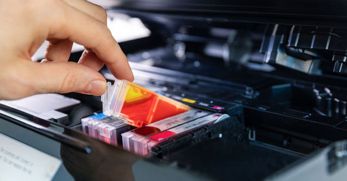 Handling an ink cartridge.