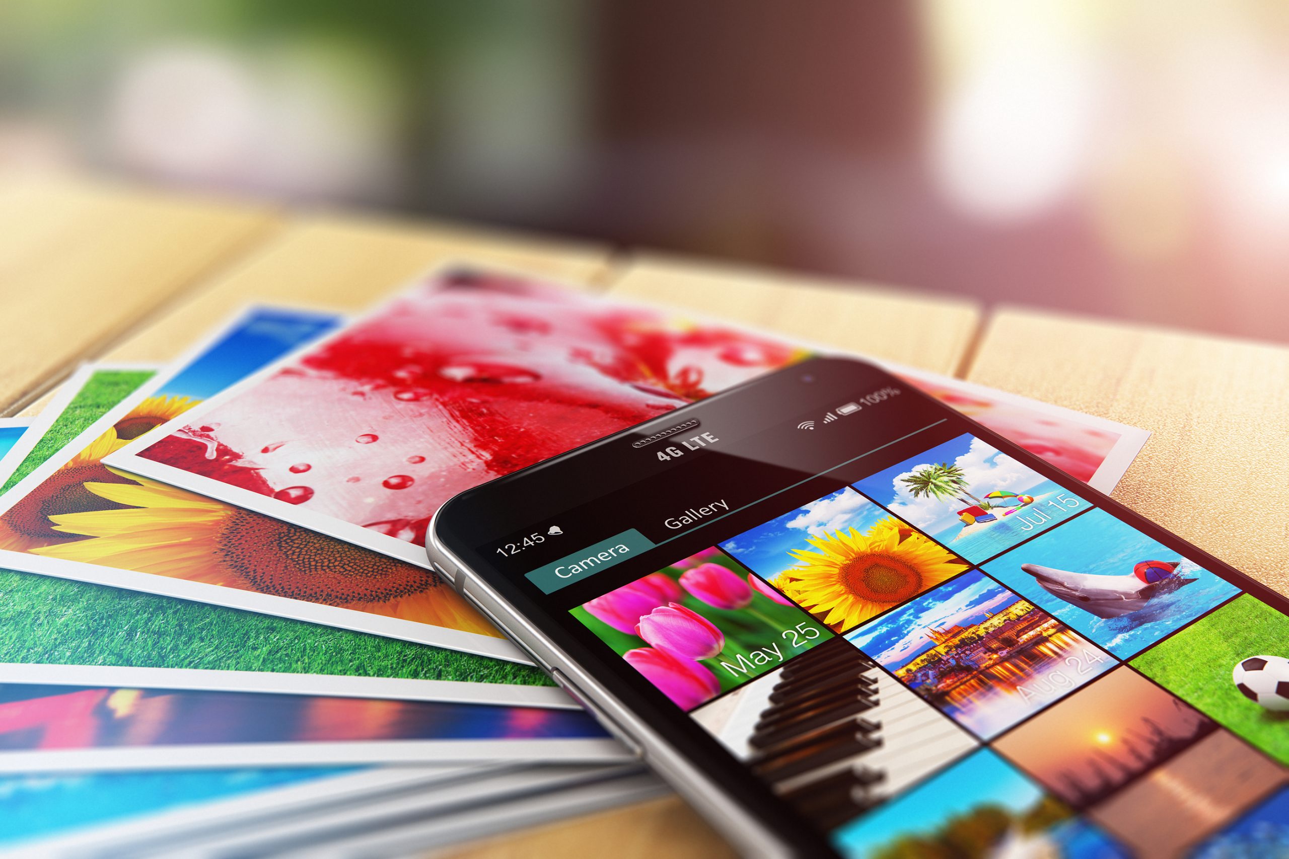 Smartphone photo album and printed photos.