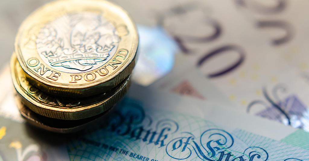 Pound coins and bank notes.